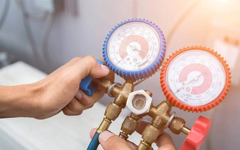 A technician assessing an HVAC system